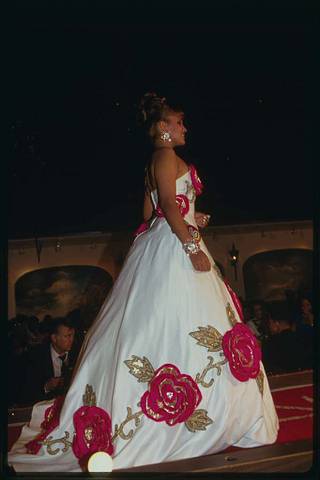 Contestant wearing evening gown walks down the runway. - PICRYL - Public  Domain Media Search Engine Public Domain Search